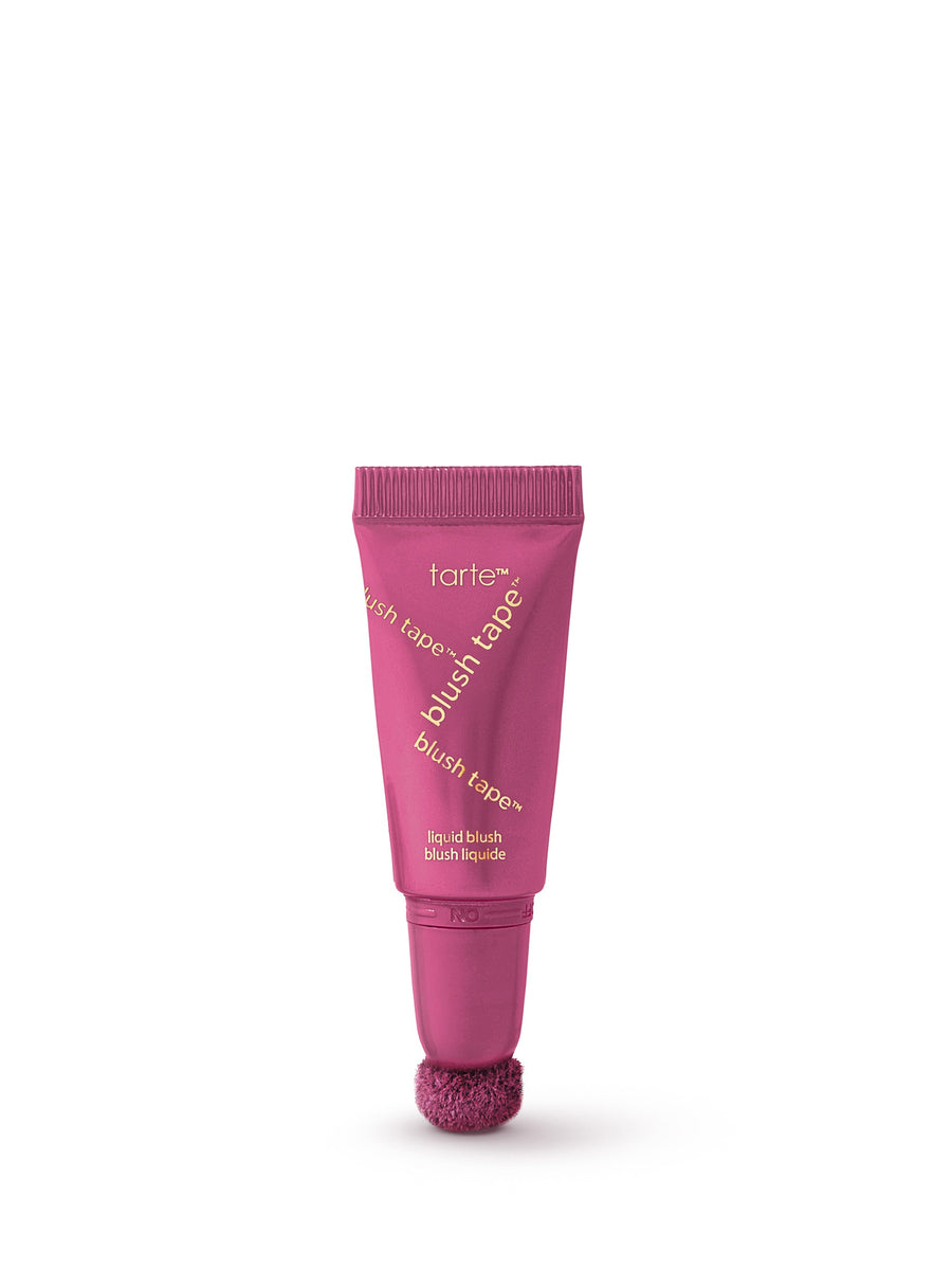 Pink tube of tarte blush tape on a white background