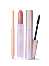 Set of makeup products including a tarte fake awake eye highlight, maracuja juicy lip plump, and tartelette tubing mascara. 