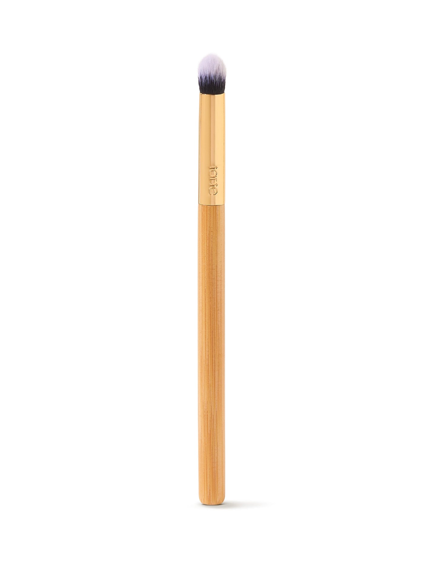 Makeup brush with a wooden handle on a white background