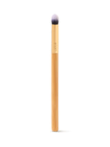 Makeup brush with a wooden handle on a white background