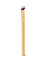Makeup brush with wooden handle and black bristle head on a white background