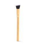 Makeup brush with wooden handle and black bristles on a white background
