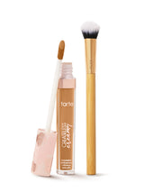 tarte creaseless creamy concealer with applicator and brush on a white background