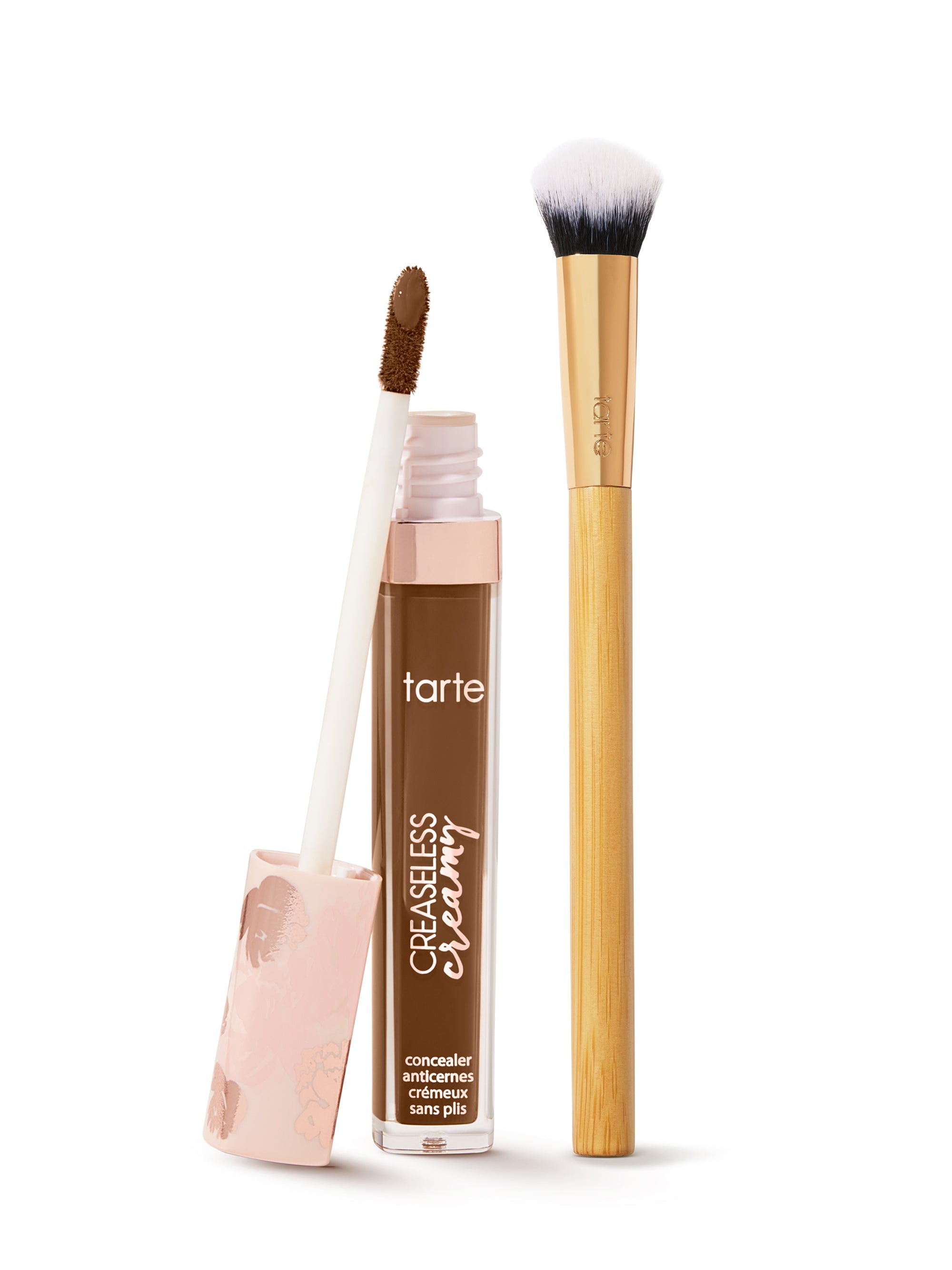  tarte creaseless creamy concealer  and brush on a white background