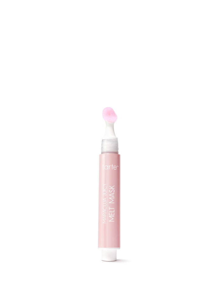 Pink skincare mask tube on a white background