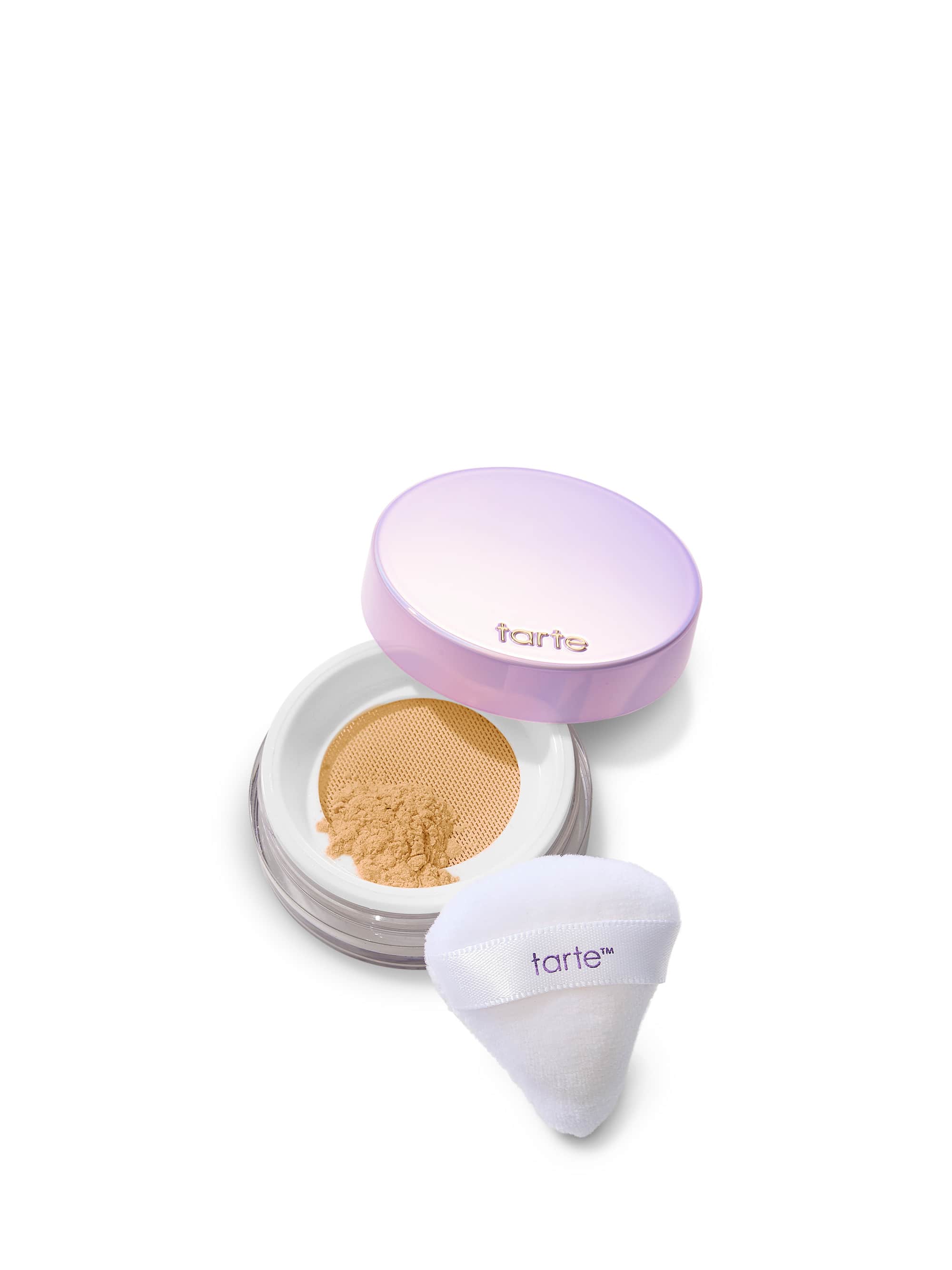 Tarte cosmetic product with open lid showing powder, white applicator, and purple lid on a white background.