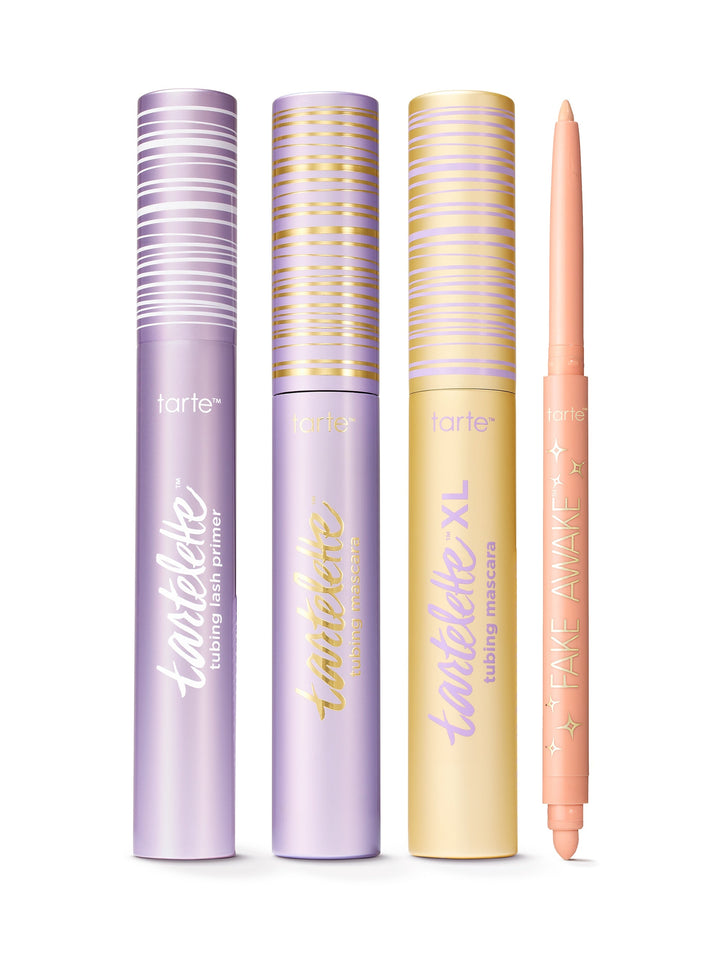 Set of lip products including lip glosses and a lip liner with packaging on a white background