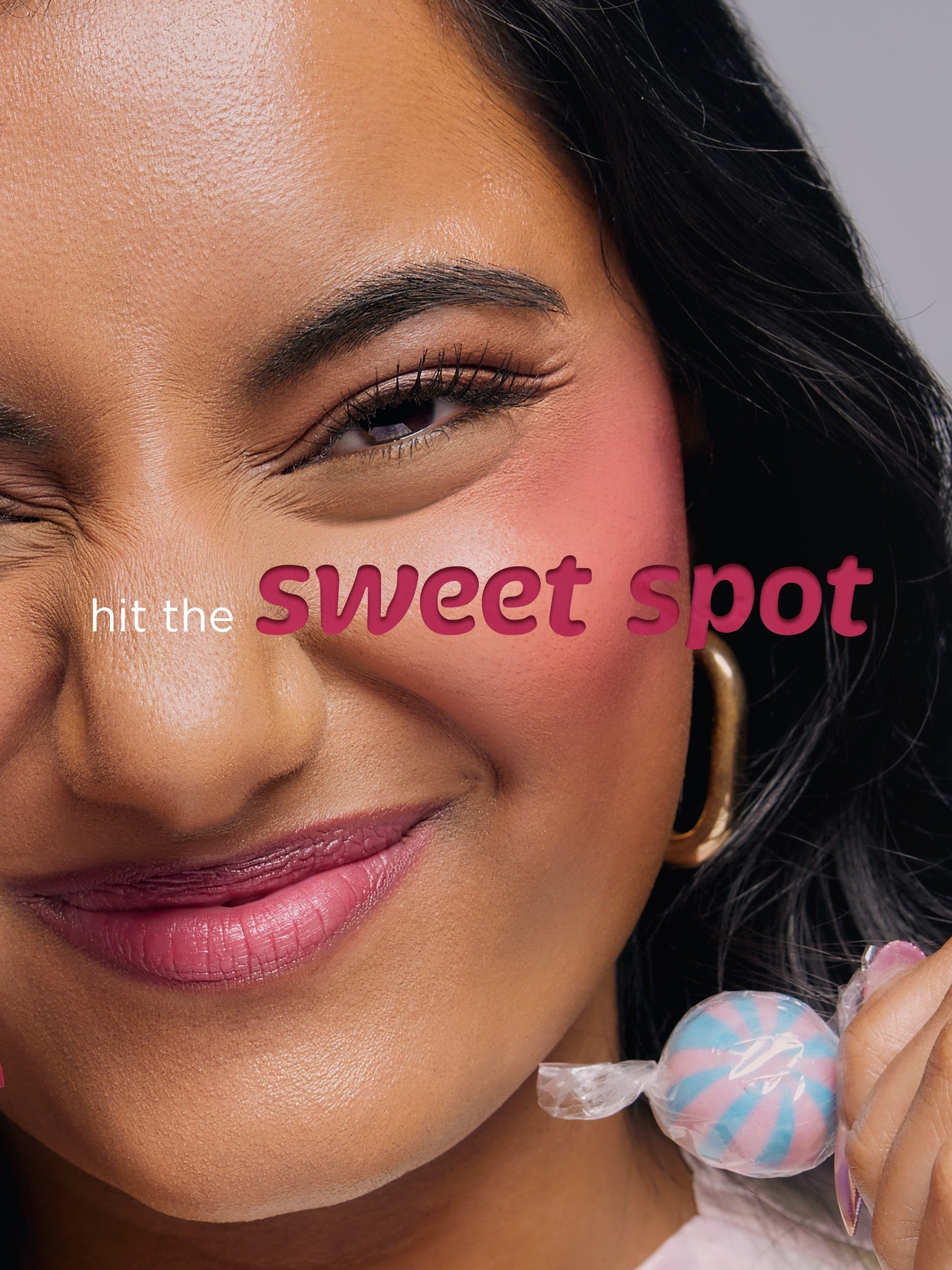 Close-up of a woman's face with 'hit the sweet spot' text overlay.