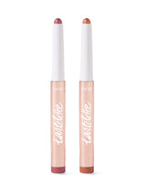 Two lip tint products with 'tartelette' branding on a white background