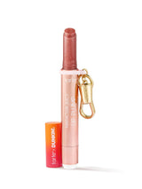 Tarte Lip Plump lip balm with carabiner on a white background