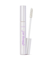 Mascara with white casing and brush on a white background