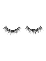 Pair of black false eyelashes on a white background