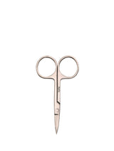 Pair of rose gold nail scissors on a white background