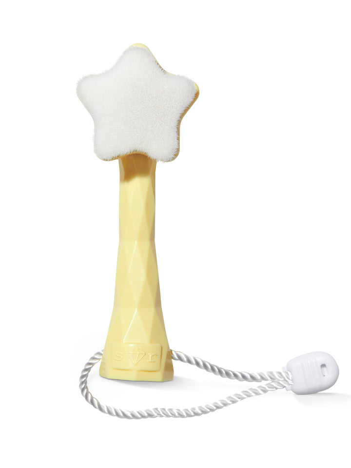 Star-shaped bath toy with a white base and gold handle on a white background