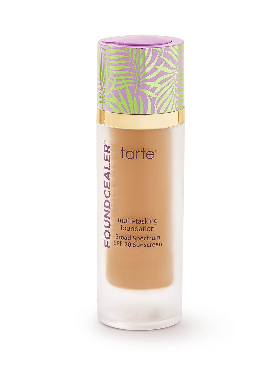 Tarte foundation bottle with colorful cap on a white background