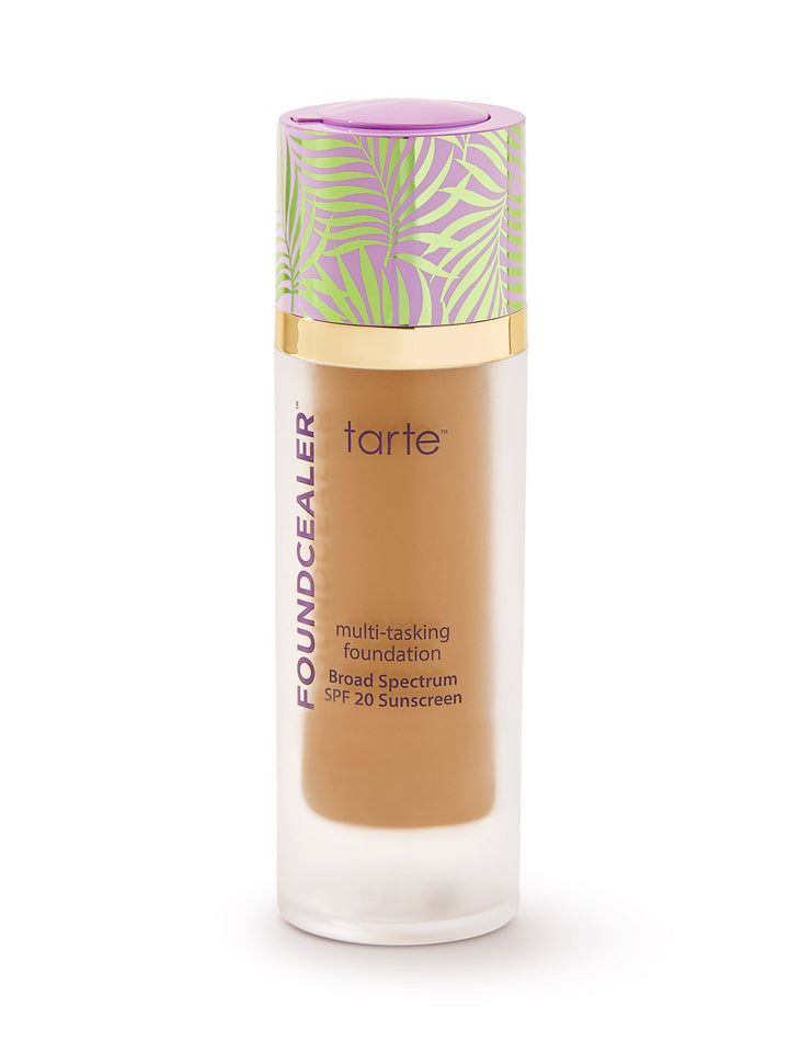Tarte foundation bottle with a colorful cap on a white background