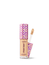 Tarte Shape Tape concealer with purple and gold packaging on a white background