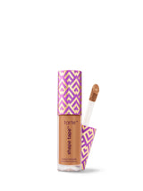 Tarte Shape Tape concealer with purple and yellow pattern on a white background