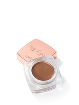 Tarte Big Ego brow product with rose gold lid on a white background