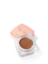 Tarte Big Ego cream eyeshadow in a rose gold container on a white background