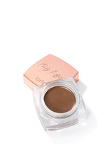 Tarte Big Ego brow product with rose gold lid on a white background