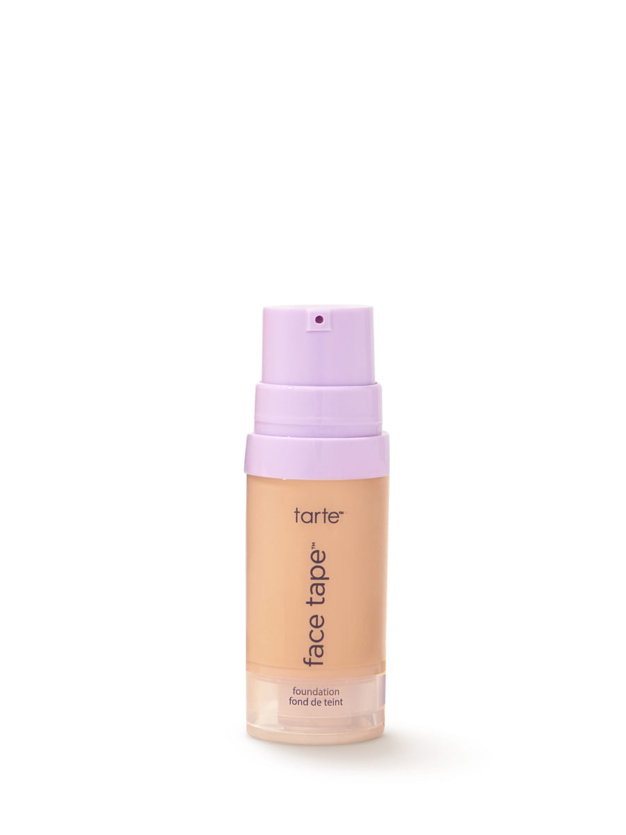 Tarte face tape foundation bottle with purple cap on a white background