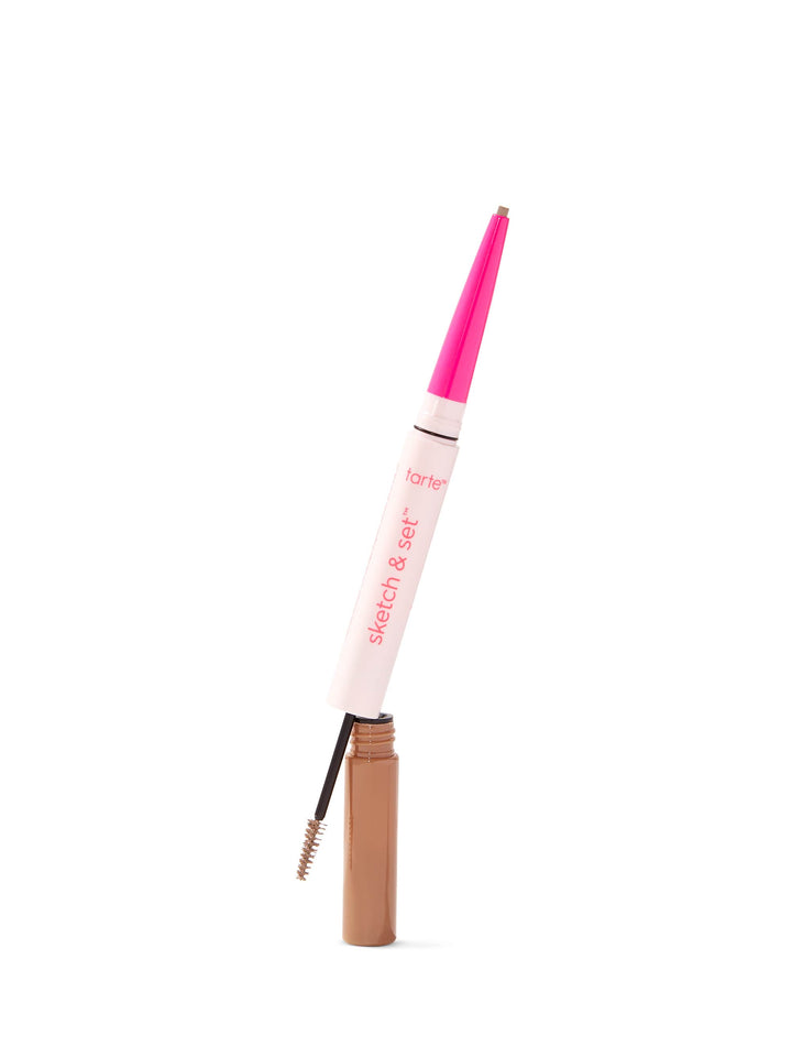 Eyebrow pencil with pink cap and brown shaft on white background