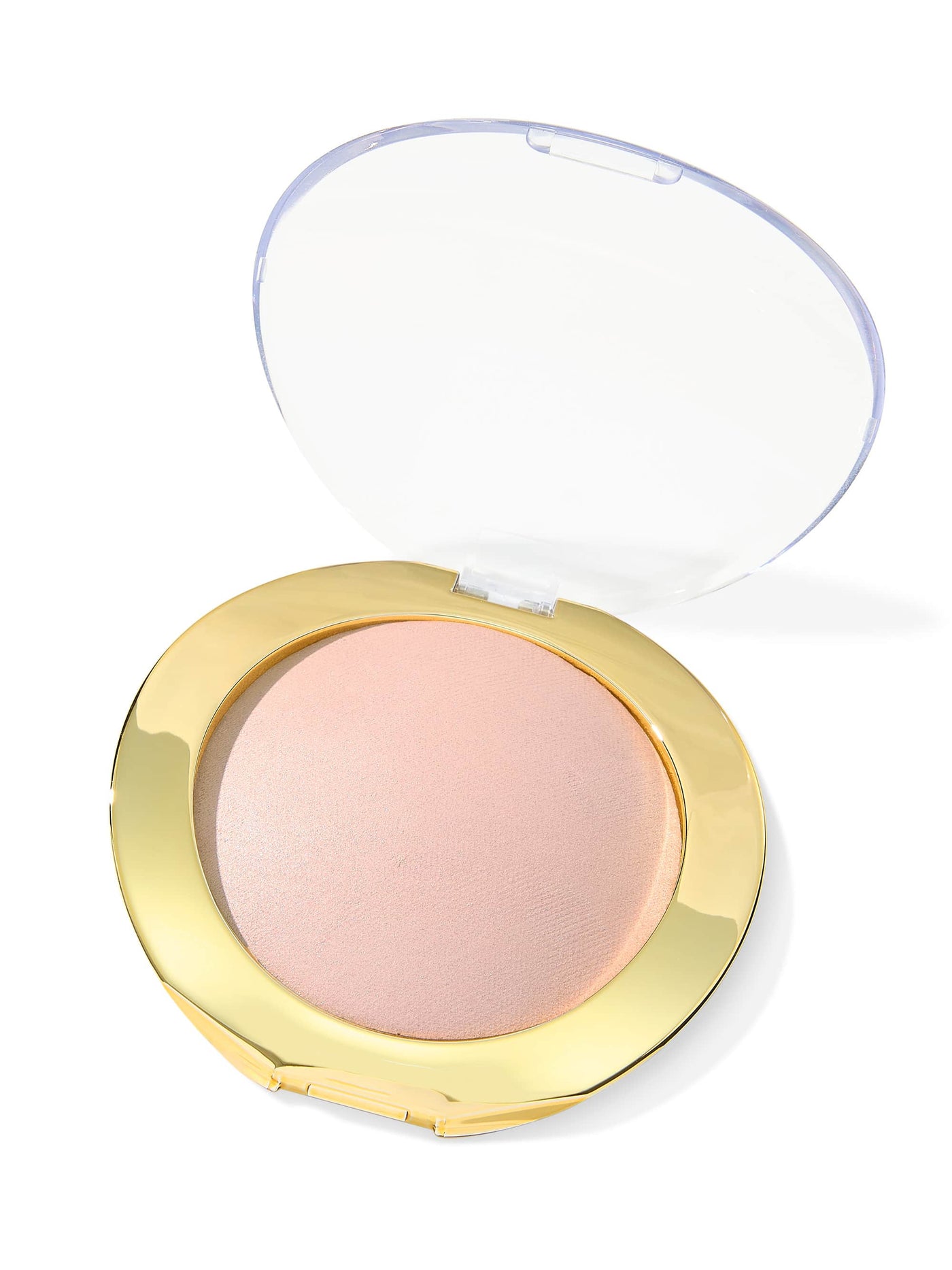 Compact powder in a gold case with a clear lid on a white background