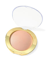 Compact powder in a gold case with a clear lid on a white background