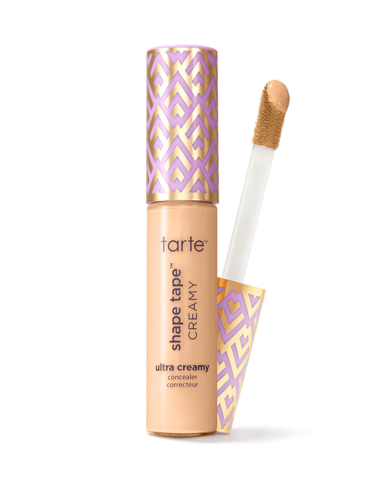 Tarte Shape Tape Creamy concealer with applicator on a white background