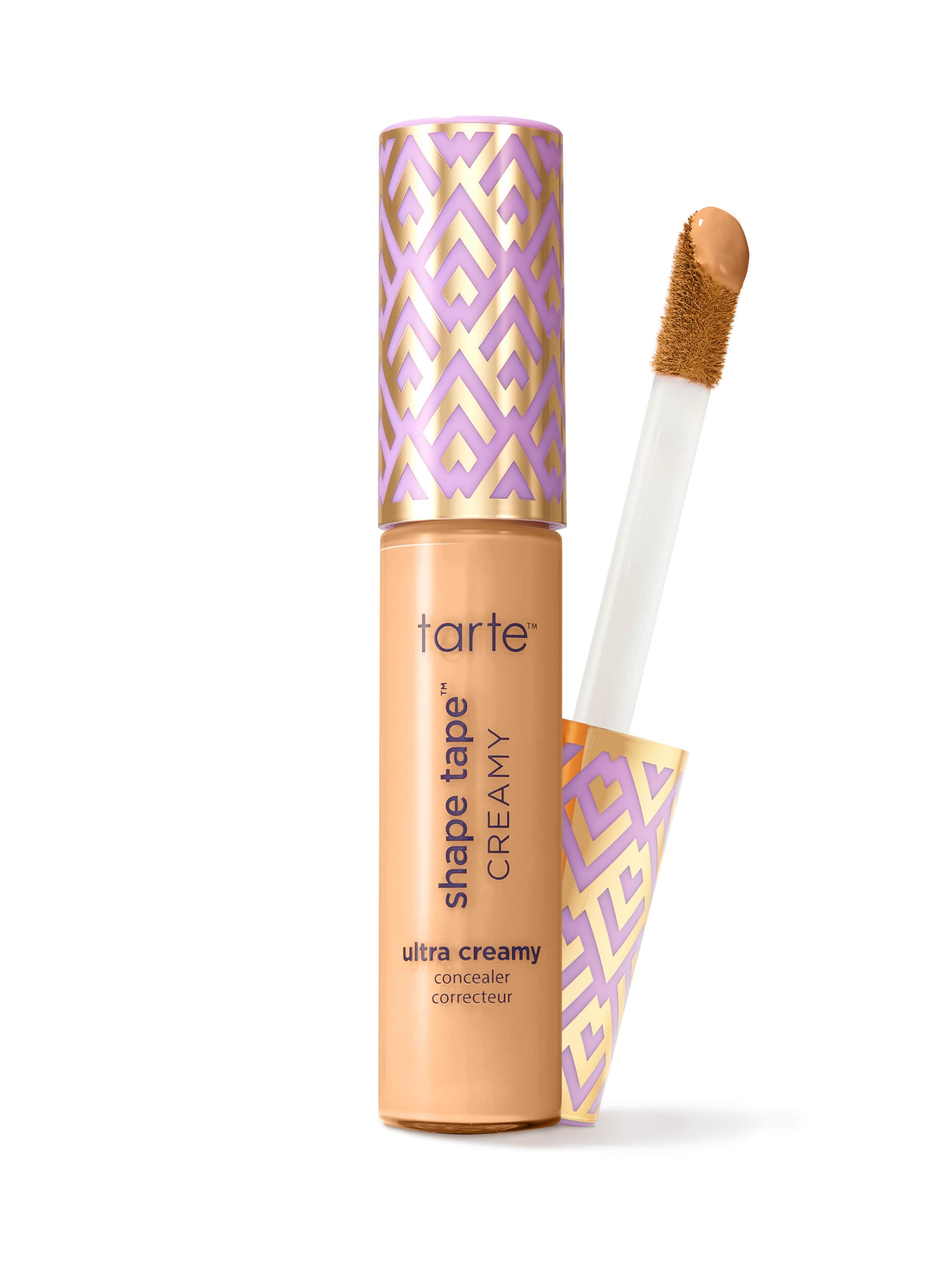 Tarte shape tape cream concealer with applicator on a white background