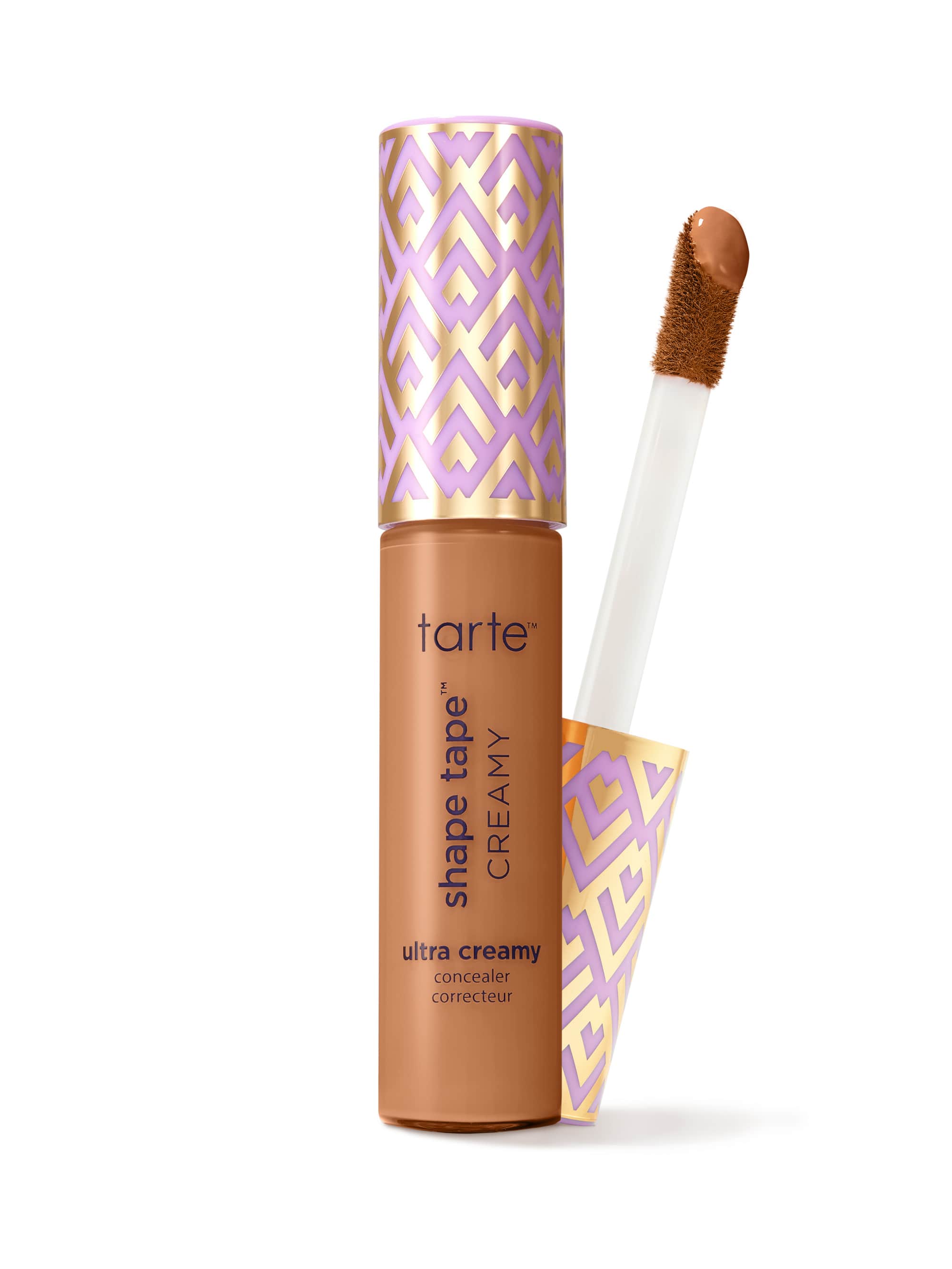 Tarte shape tape cream concealer with applicator on a white background