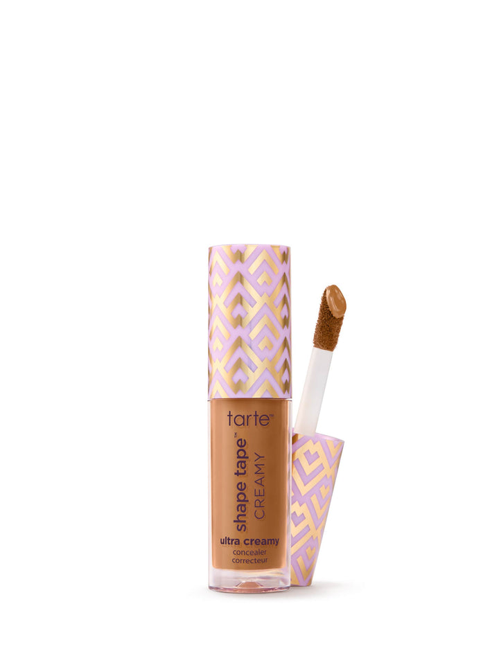 Tarte Shape Tape Creamy concealer with applicator on a white background