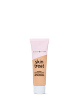 Tube of 'skin treat' sunscreen with pink cap on a white background