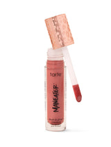 Tarte blush & glow cream blush with applicator on a white background