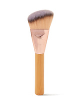 Makeup brush with wooden handle and gray bristles on a white background