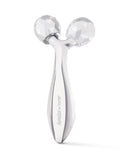 Silver facial roller with brand name on a white background