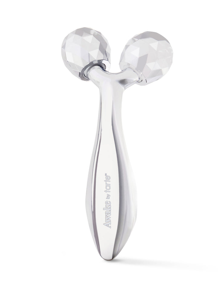 Silver facial roller with brand name on a white background