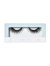 Eyelash packaging with 'surfer curl' text on a white background