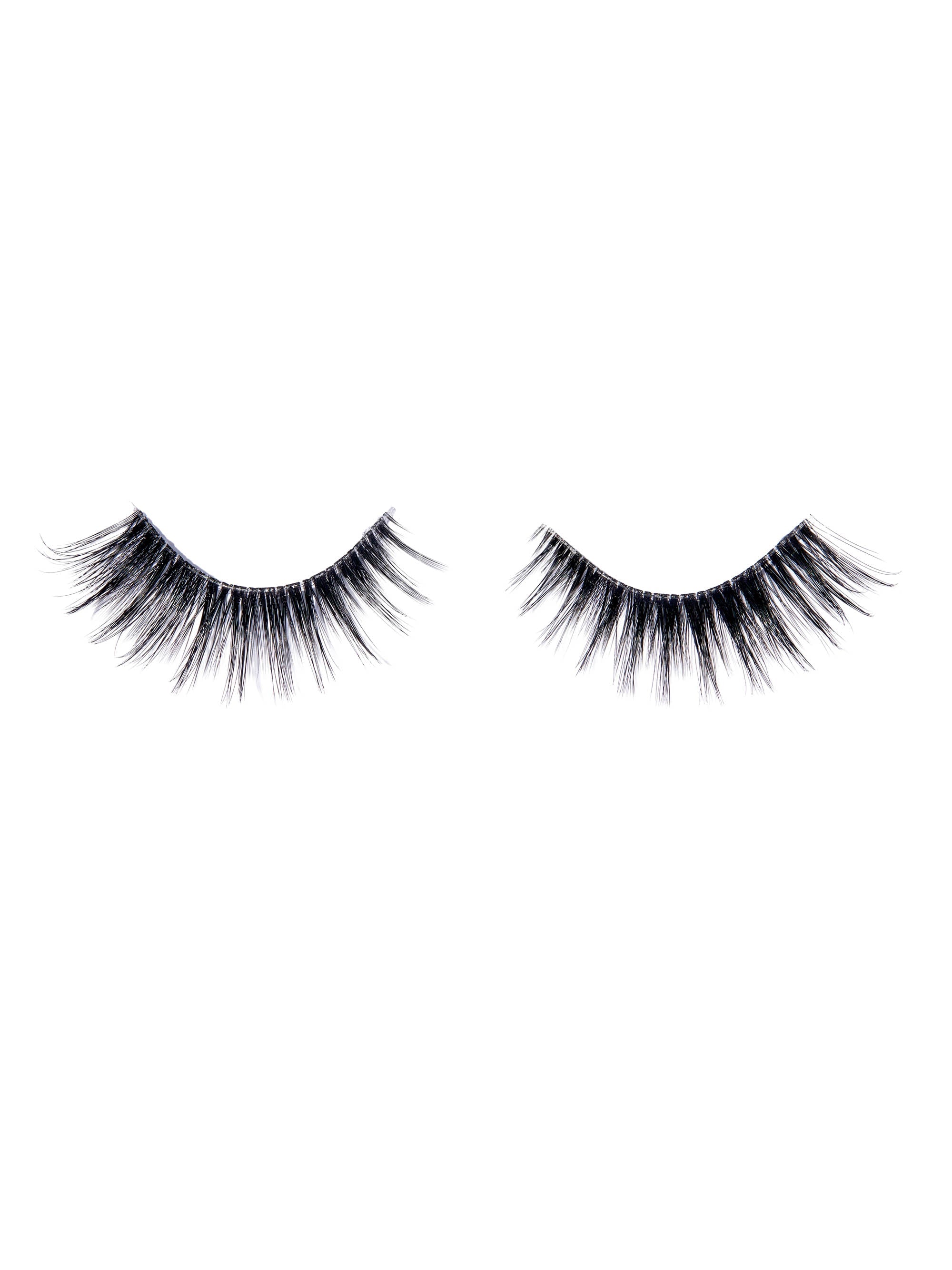 Pair of black false eyelashes on a white background