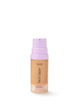 Tarte face tape foundation bottle with purple cap on a white background