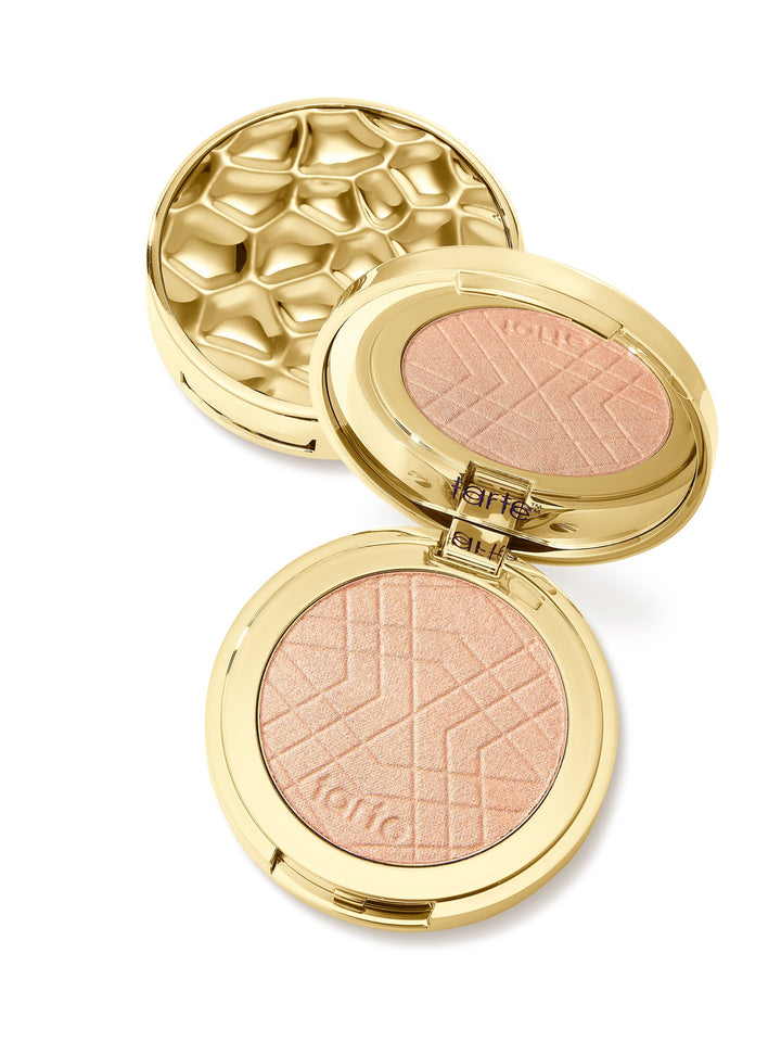 Two open gold compacts with blush shades on a white background