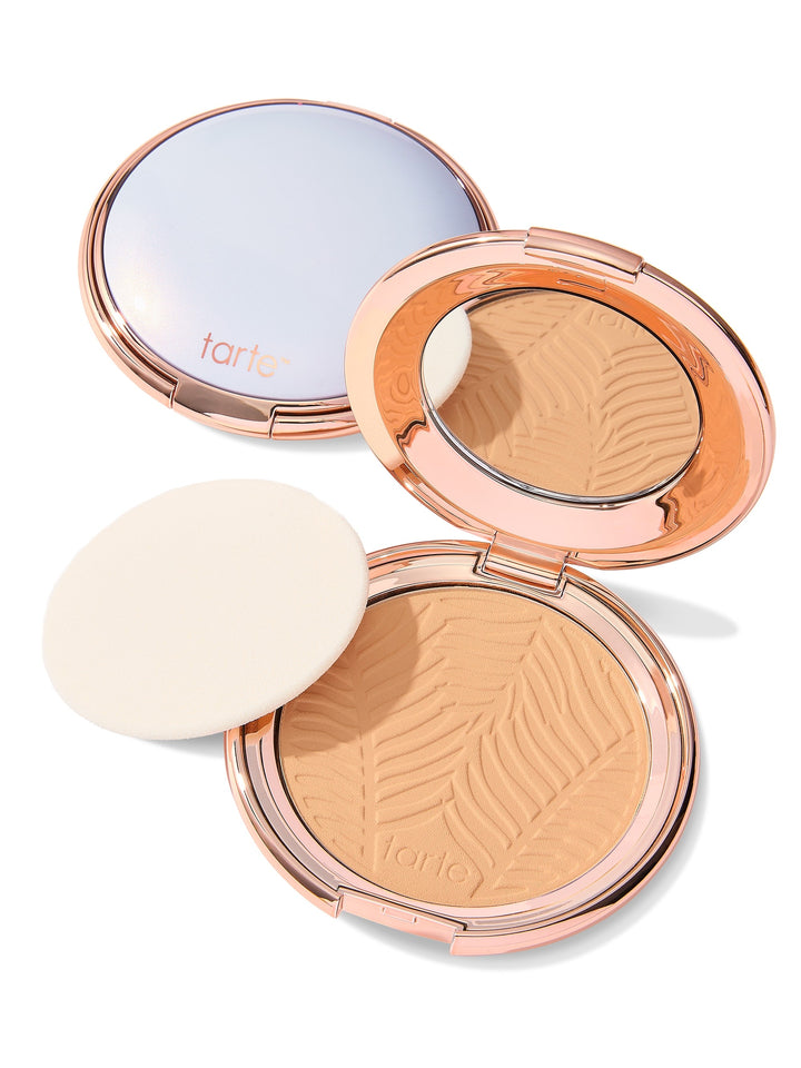 Compact powder with a visible brand logo on a white background