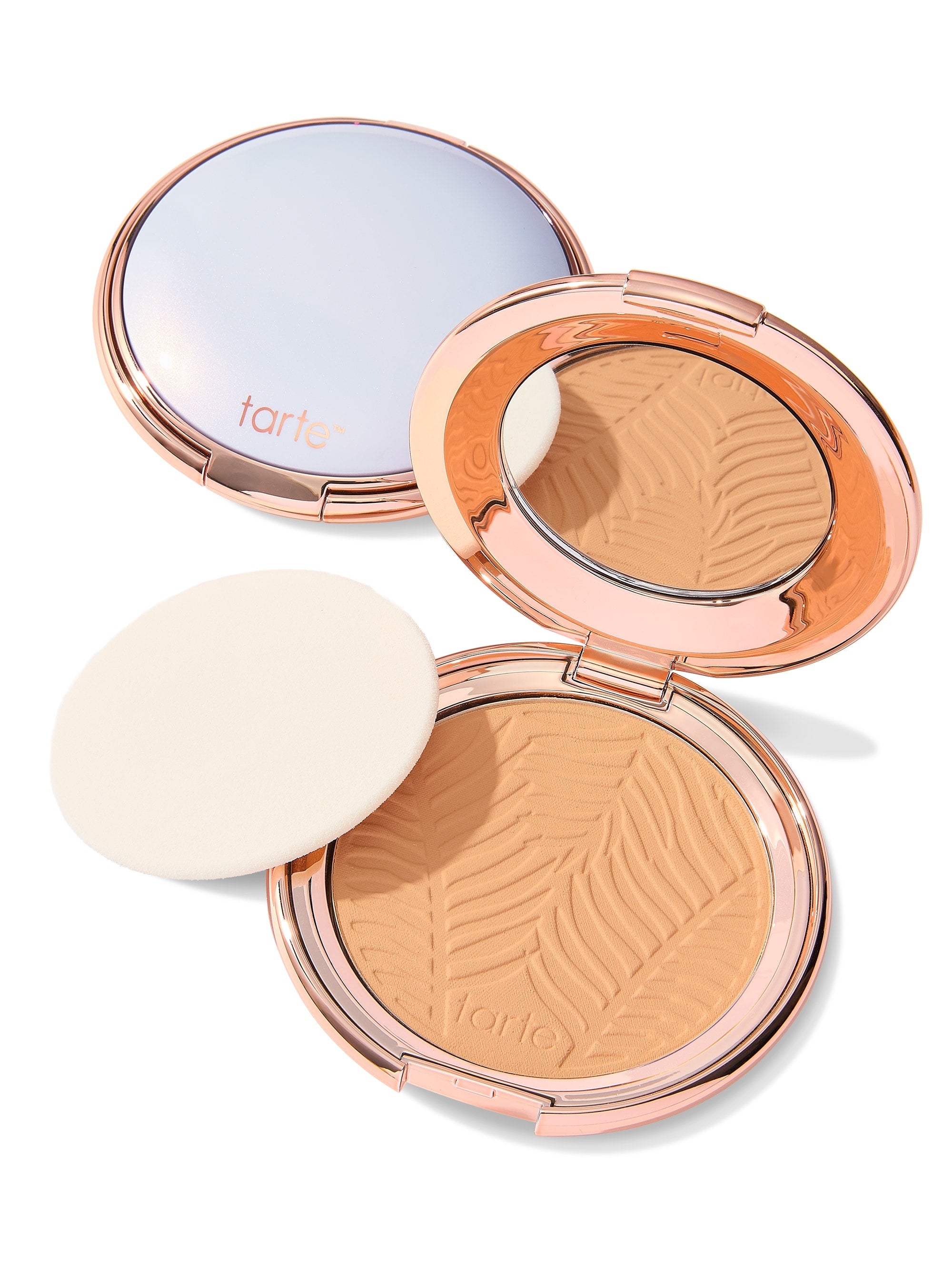 Compact powder with a visible brand logo on a white background