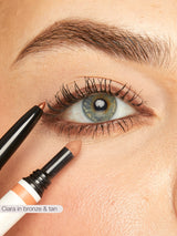 Eyeliner being applied to a blue eye with a close-up of the eyeliner pen.