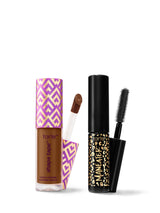 Tarte makeup products including a lip product and mascara on a white background