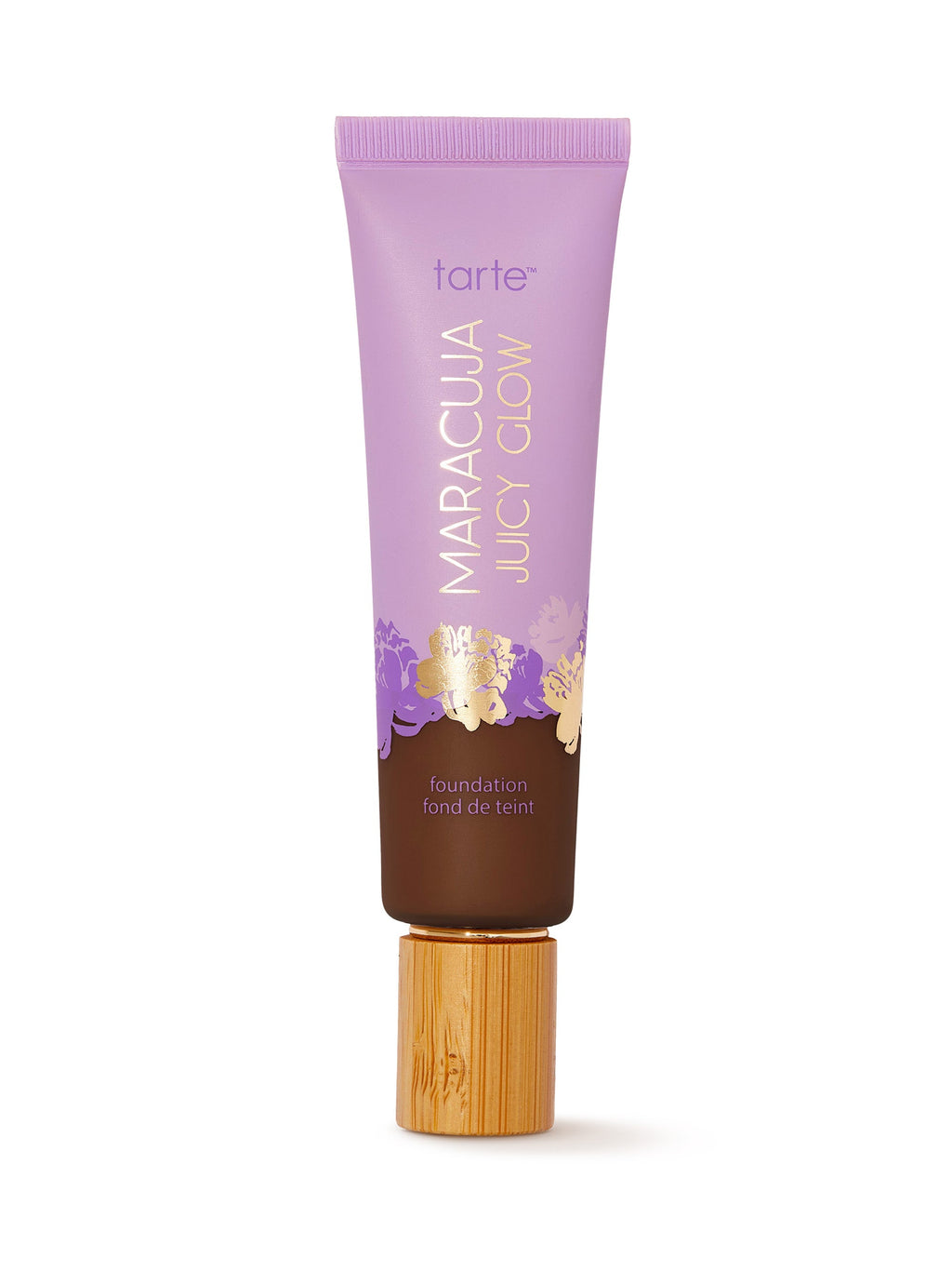 Tarte Maracuja Juicy Glow foundation tube with purple cap on a white background