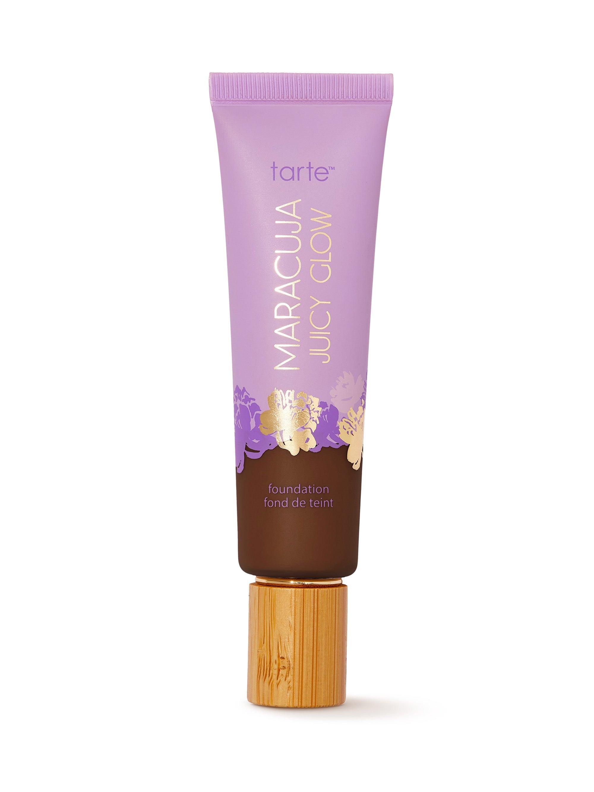 Tarte Maracuja Juicy Glow foundation tube with purple cap on a white background